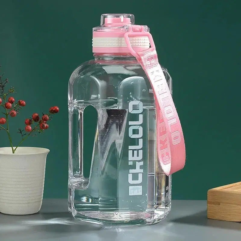 Look Loom 2 liter gym water bottle with clear body and pink handle strap for easy carrying