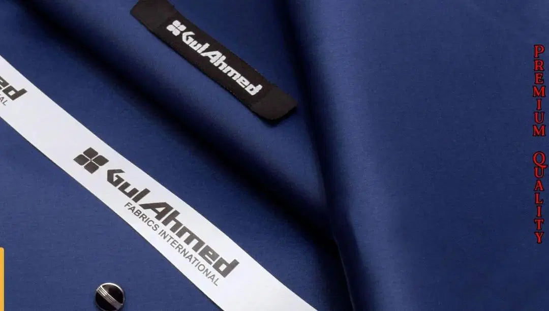 Look Loom navy blue men's unstitched cotton suit fabric close up with label and button detail