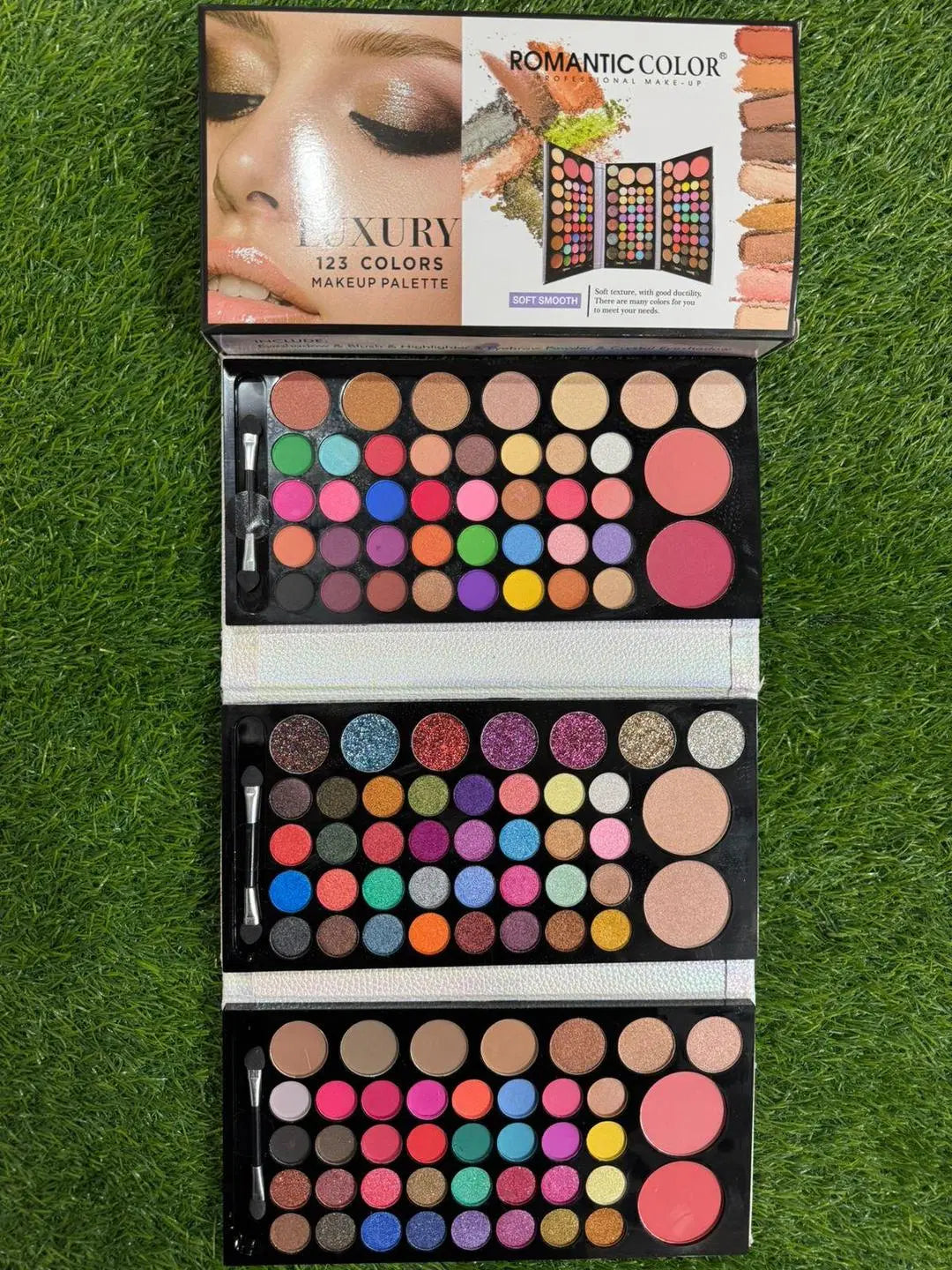 Look Loom multicolor eyeshadow palette with 123 vibrant shades in three layers including blush and applicators