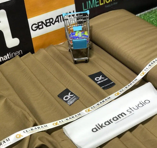 Look Loom men's unstitched wash and wear suit brown fabric with Alkaram studio labels and mini shopping cart prop