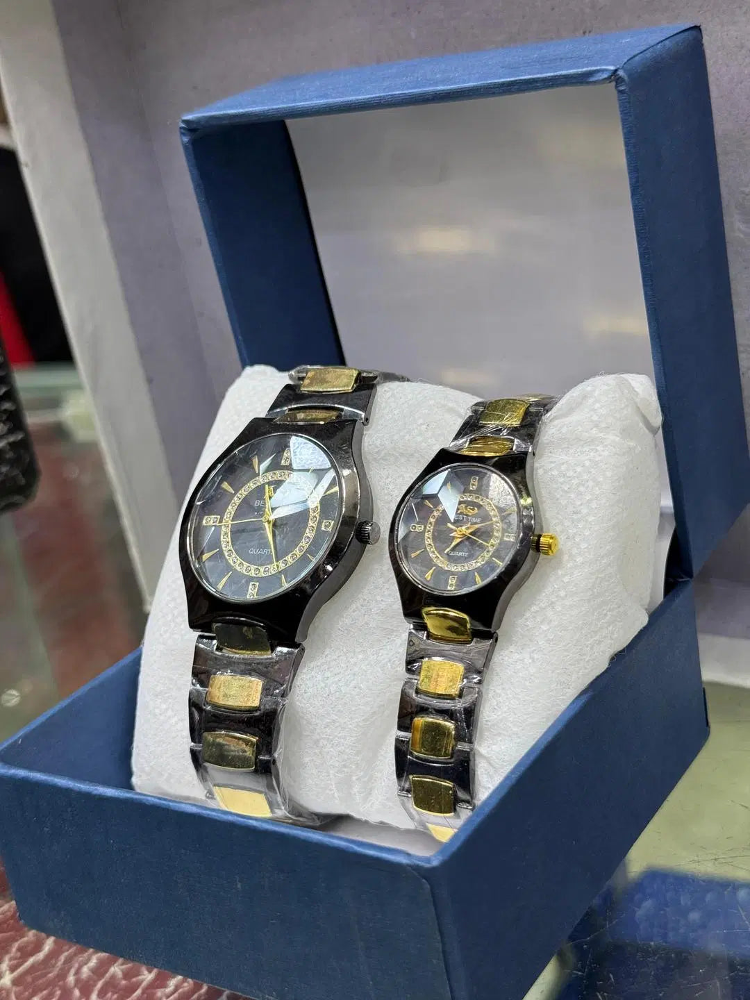 Look Loom black and gold couple watches set in blue gift box with matching metal bands and analog dials