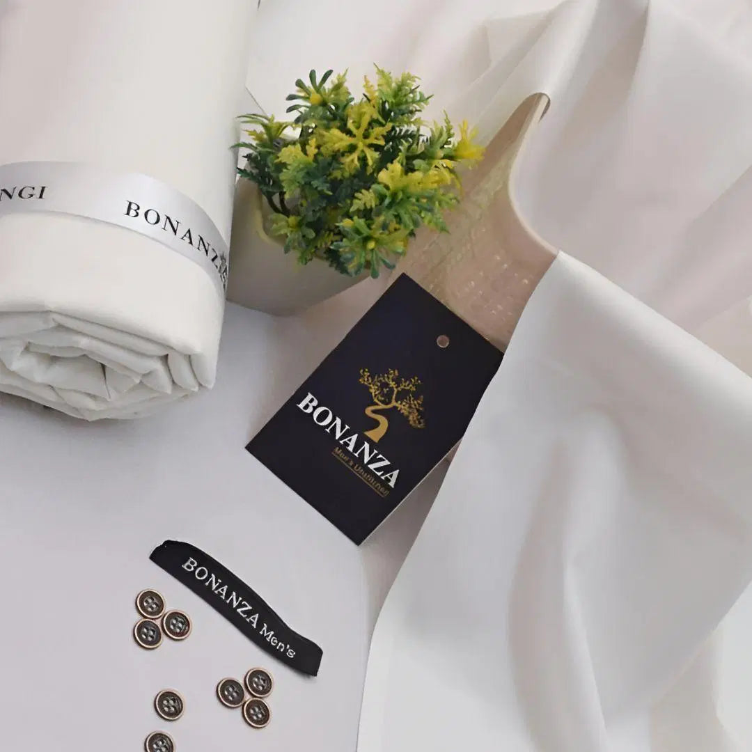 Look Loom men’s unstitched wash and wear suit white fabric roll with Bonanza tag buttons and sample trim