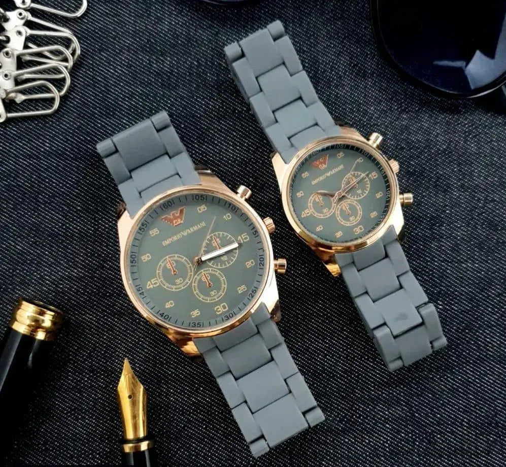 Look Loom couple chronograph watches with gray silicone straps and gold tone cases on denim backdrop