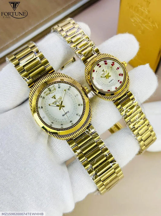 Look loom women's quartz watch set with gold metal bands and white dials held on a gloved hand