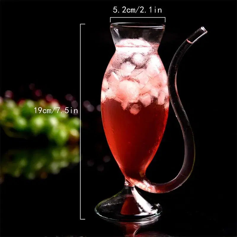 Look Loom insulated glass travel mug with curved handle filled with iced red beverage