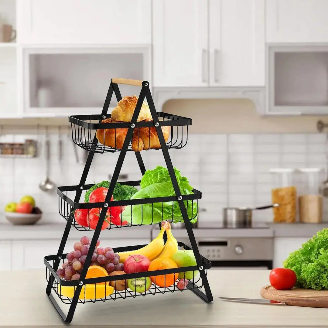 Look Loom kitchen countertop fruit basket with three tiers holding fruits and vegetables on modern kitchen counter