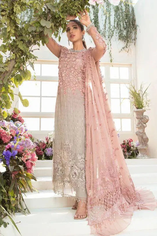 Look loom pink chiffon embroidered suit worn by woman with floral embroidery and delicate lace details