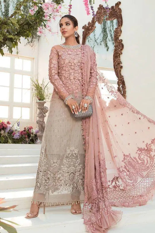 Look loom pink chiffon embroidered suit with intricate floral embroidery and sheer dupatta on woman