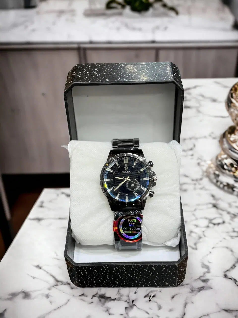 Look loom stylish men's wristwatch with black dial and metal band displayed in black gift box