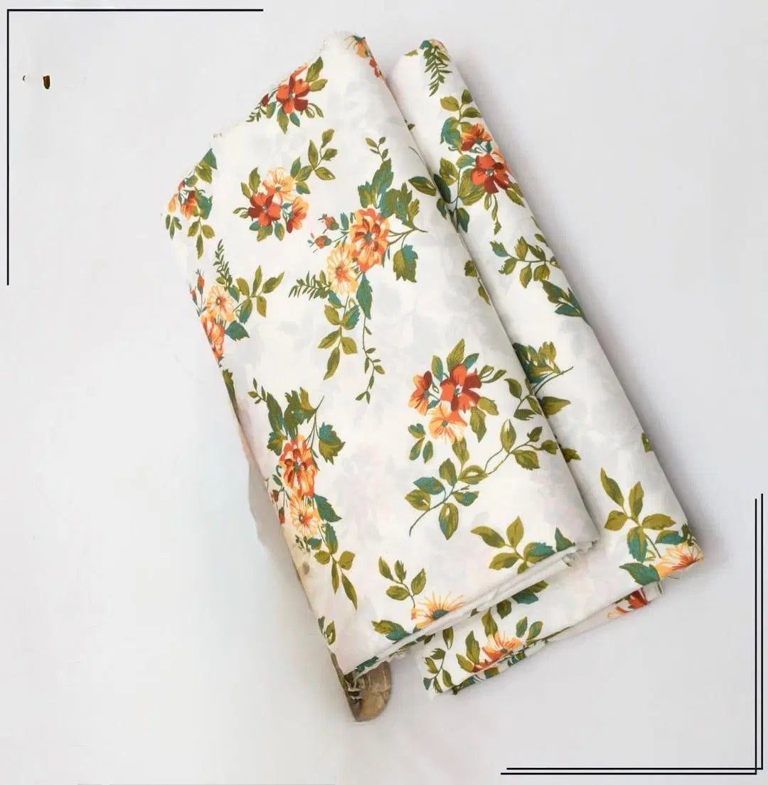 Look loom women's unstitched suit set with white fabric and orange floral print design